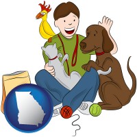 georgia map icon and a young man pet sitting a cat, a dog, and a bird